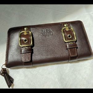 Coach wallet. Zoe Legacy double buckle leather zip wallet. Brass hardware.
